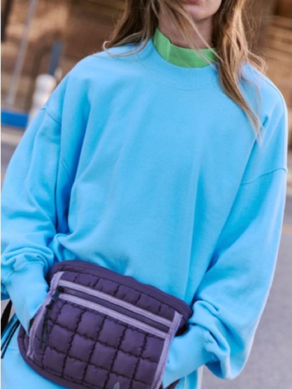 Free People Movement
Quilted Muff Sling Bag